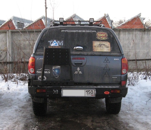 картинка Бампер задний Mitsubishi L200 2009, Toyota HILUX 2011 OJ