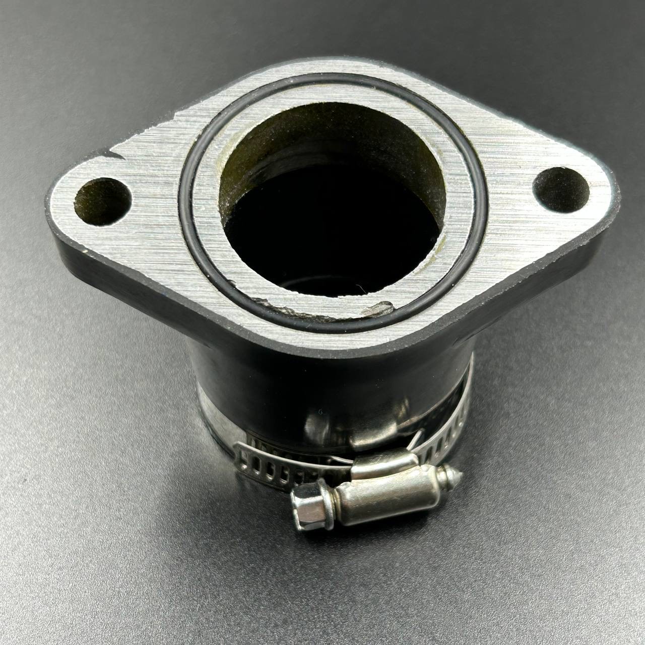 картинка Патрубок карбюратора Yamaha Grizzly 400 450 (PREMARINE)