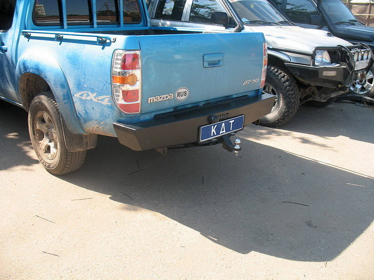 картинка Бампер задний Mazda/Ford  KDT Спорт