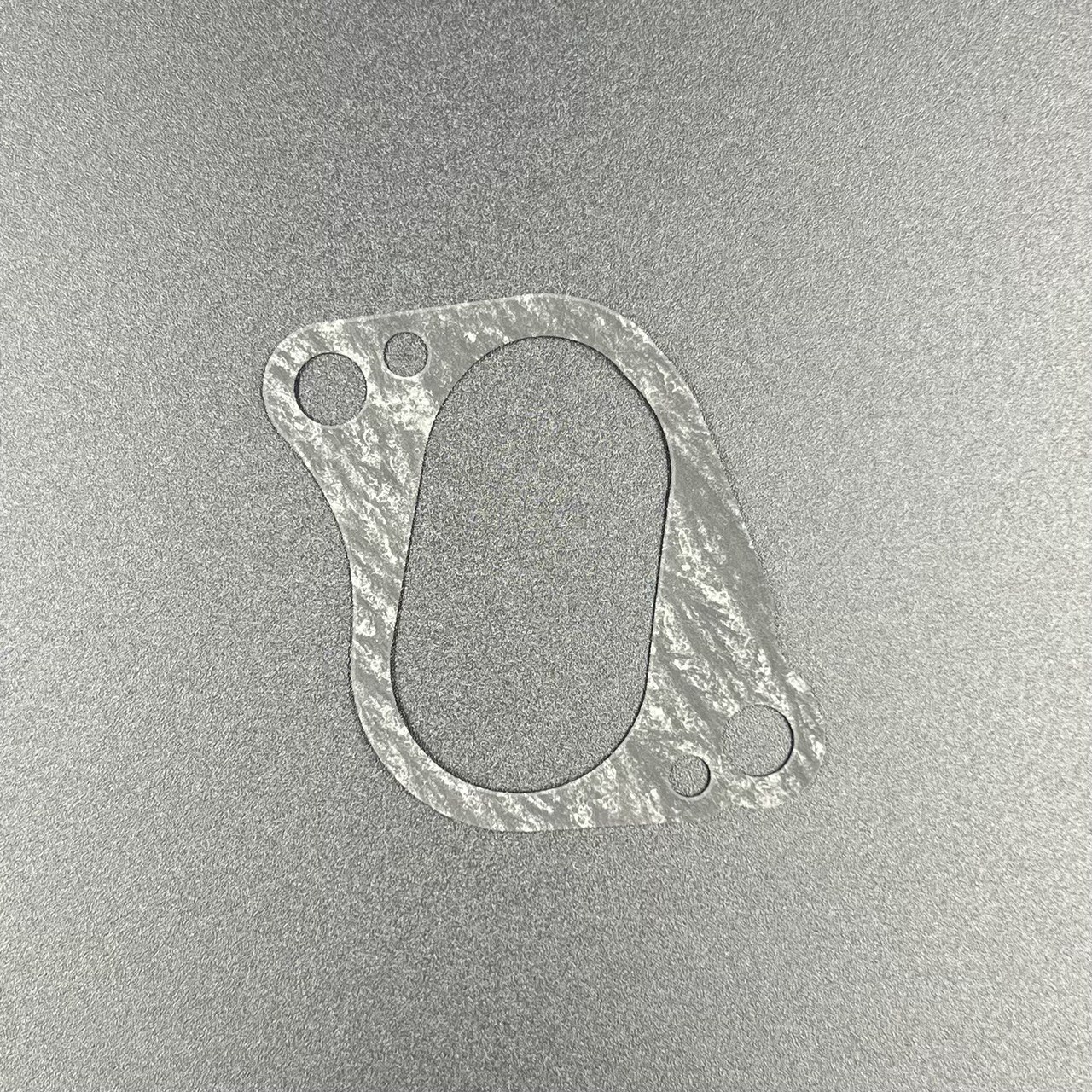 картинка Прокладка карбюратора SUZUKI  DF9,9-20A