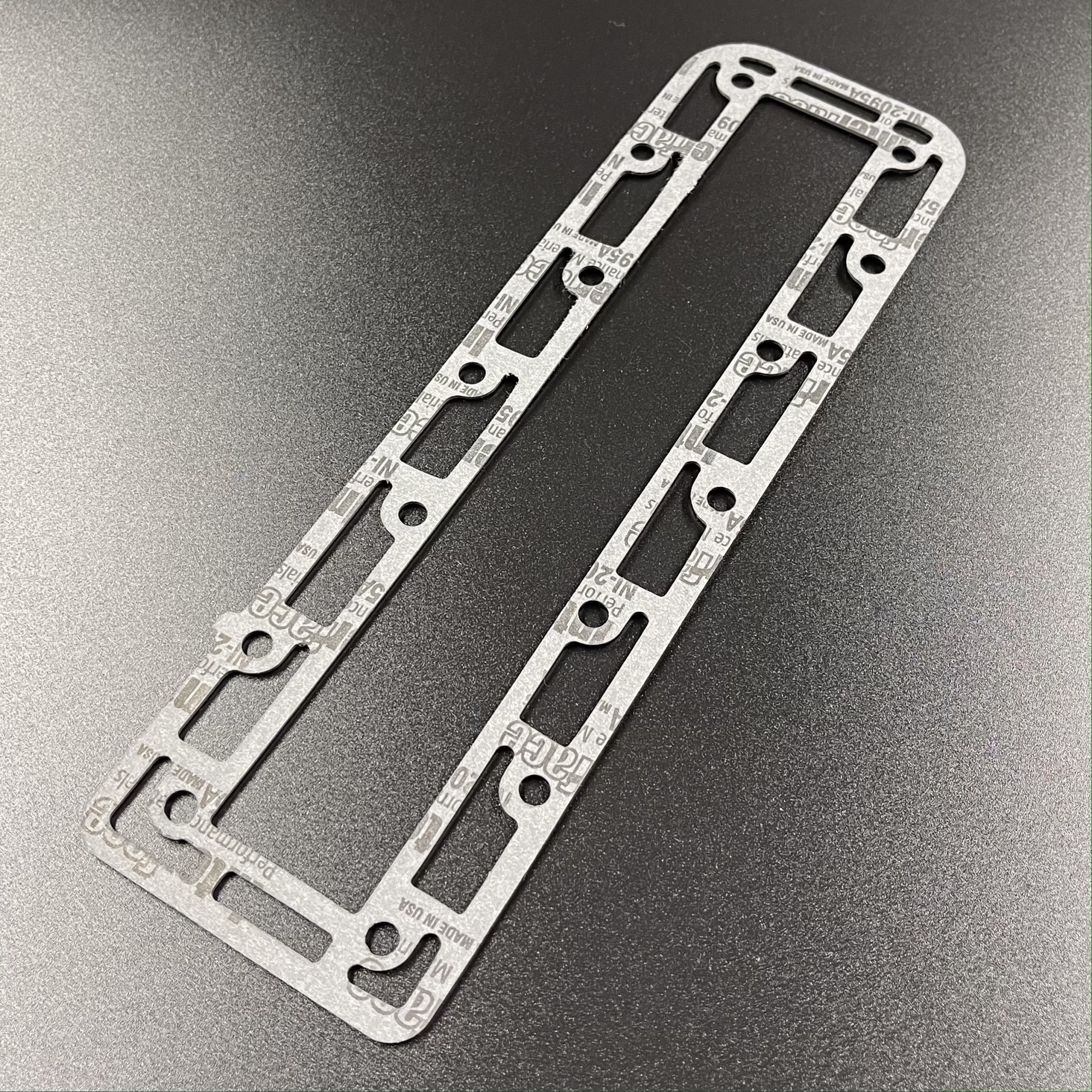 картинка Прокладка выхлопного коллектора Tohatsu 40-50 (Omax)