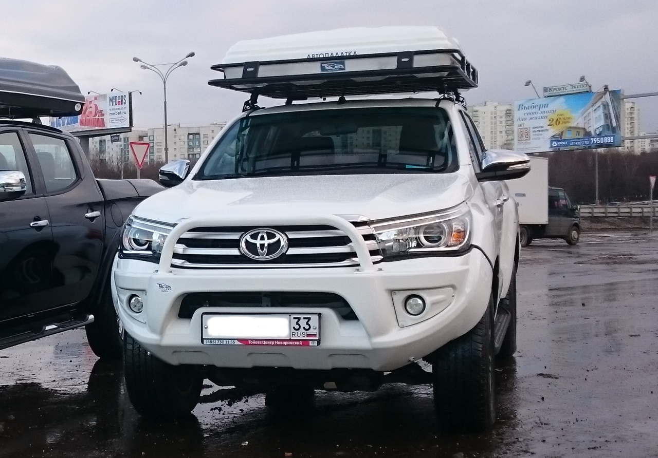 картинка Бампер передний Toyota HIlux Revo 2015-07.2018 без оптики черный АВС-дизайн