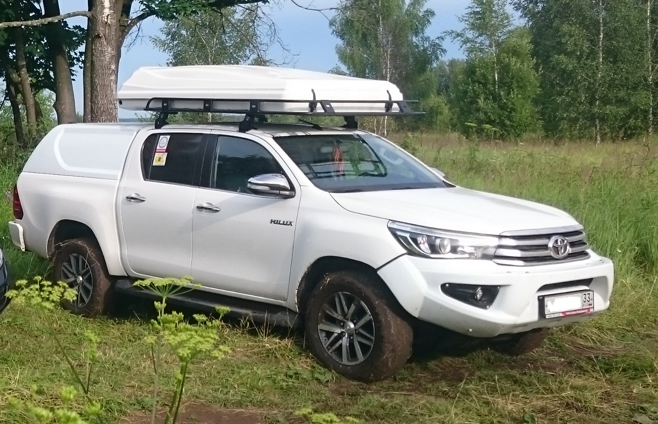 картинка Бампер передний Toyota HIlux Revo 2015-07.2018 с оптикой белый АВС-дизайн