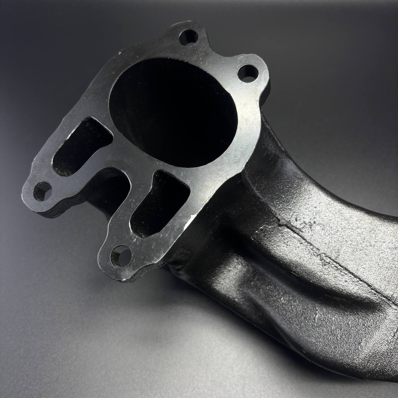 картинка Колено выпускное Mercruiser D3.0/ 3.6/ 4.2 L (Quicksilver)