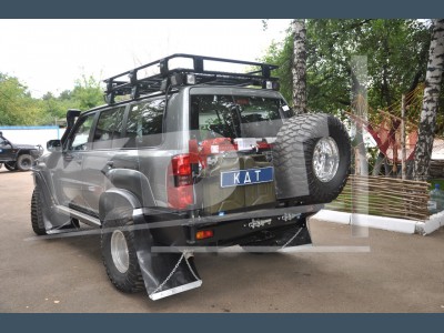 картинка Бампер задний KDT силовой II поколения для Nissan Patrol 61 кузова, с местами под дублирующую оптик