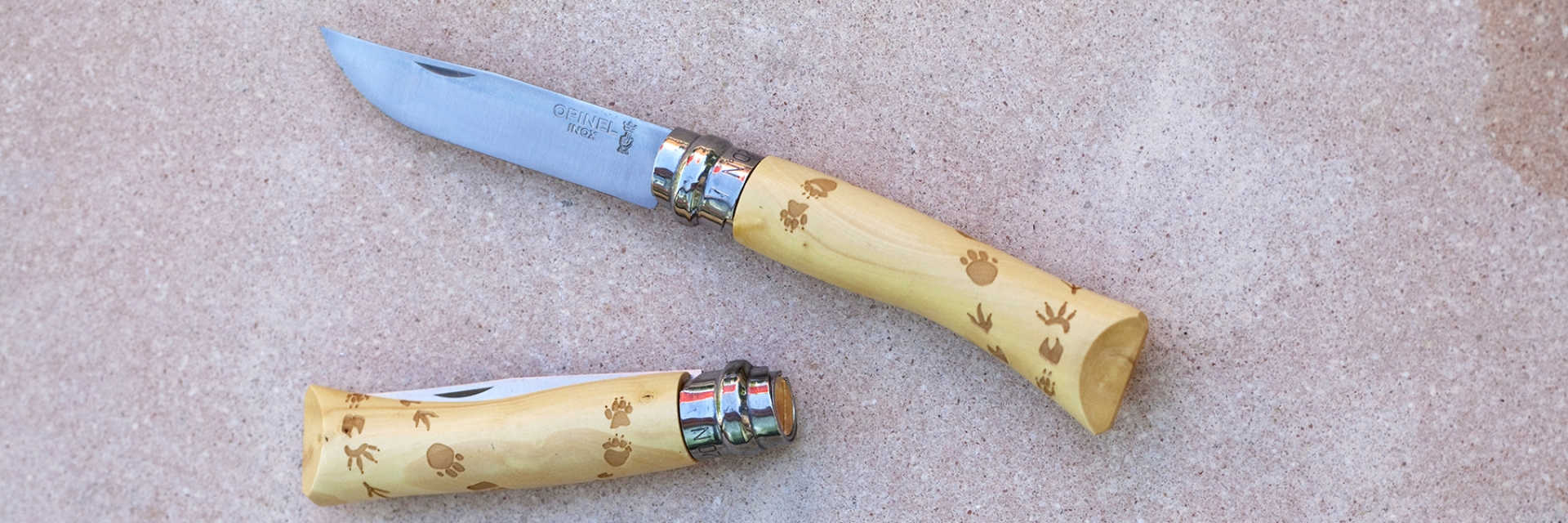 картинка Нож Opinel №7 Nature, нержавеющая сталь, рукоять самшит, гравировка следы, 001550