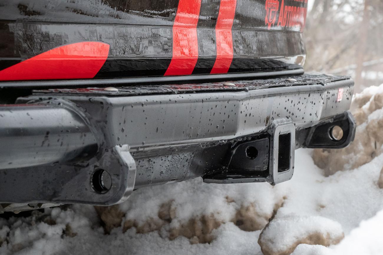 картинка Бампер задний РИФ силовой Toyota Fortuner 2015+ c квадратом под фаркоп