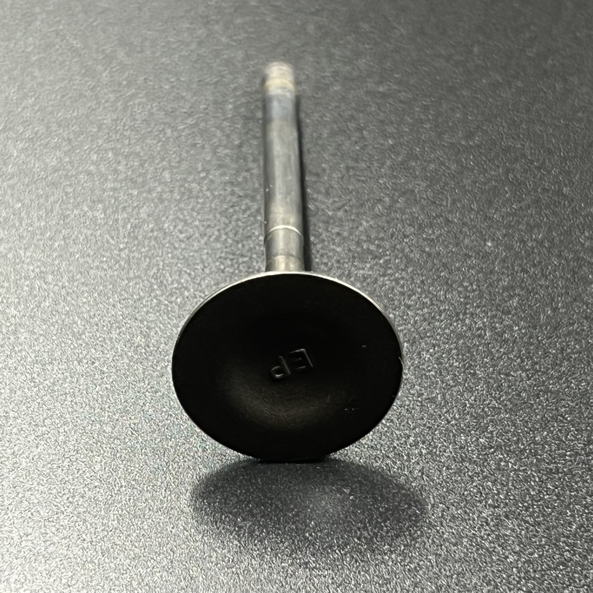Клапан выпускной Suzuki DF25-30A (Suzuki)