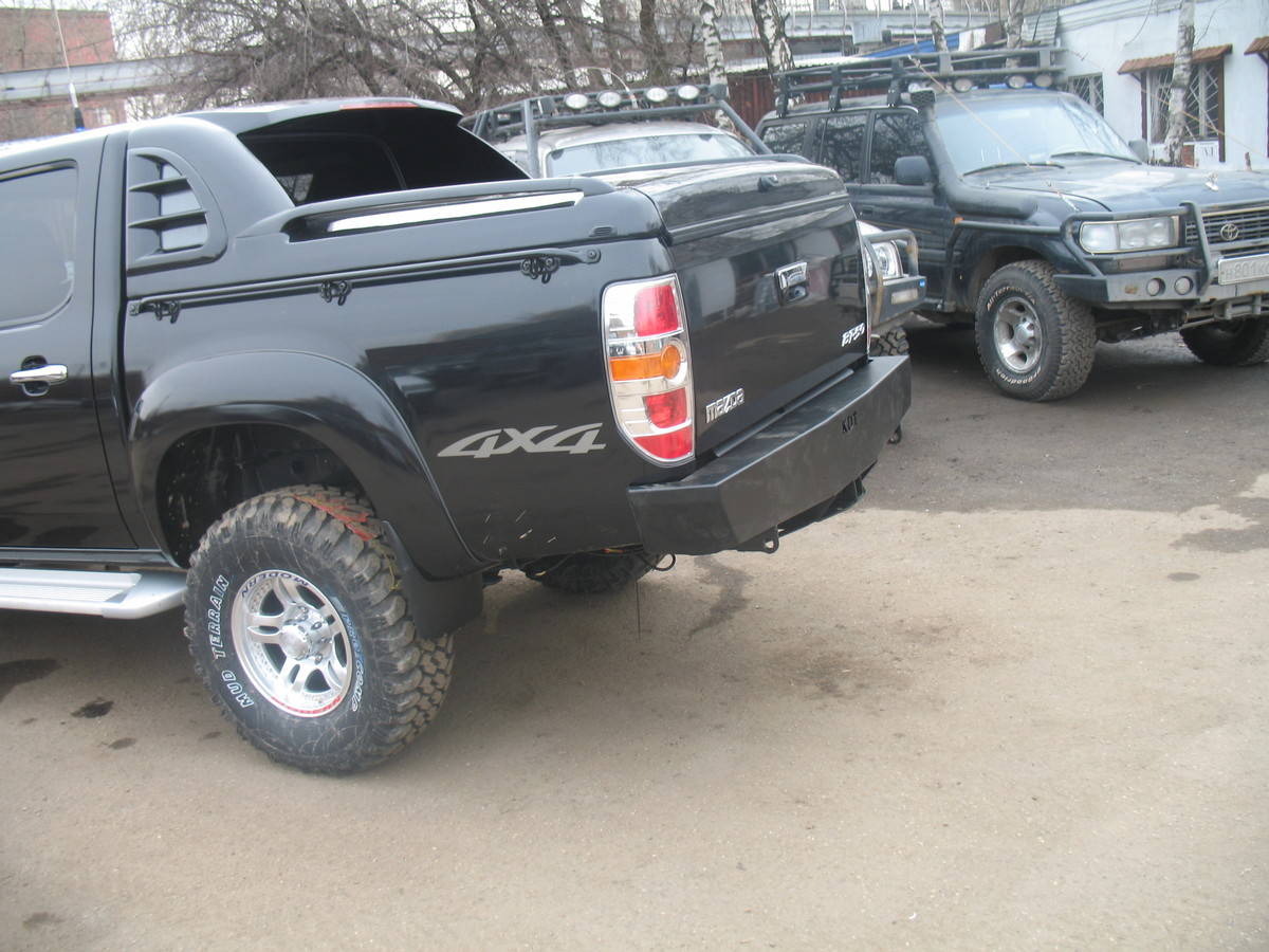 картинка Бампер задний Mazda/Ford  KDT Спорт