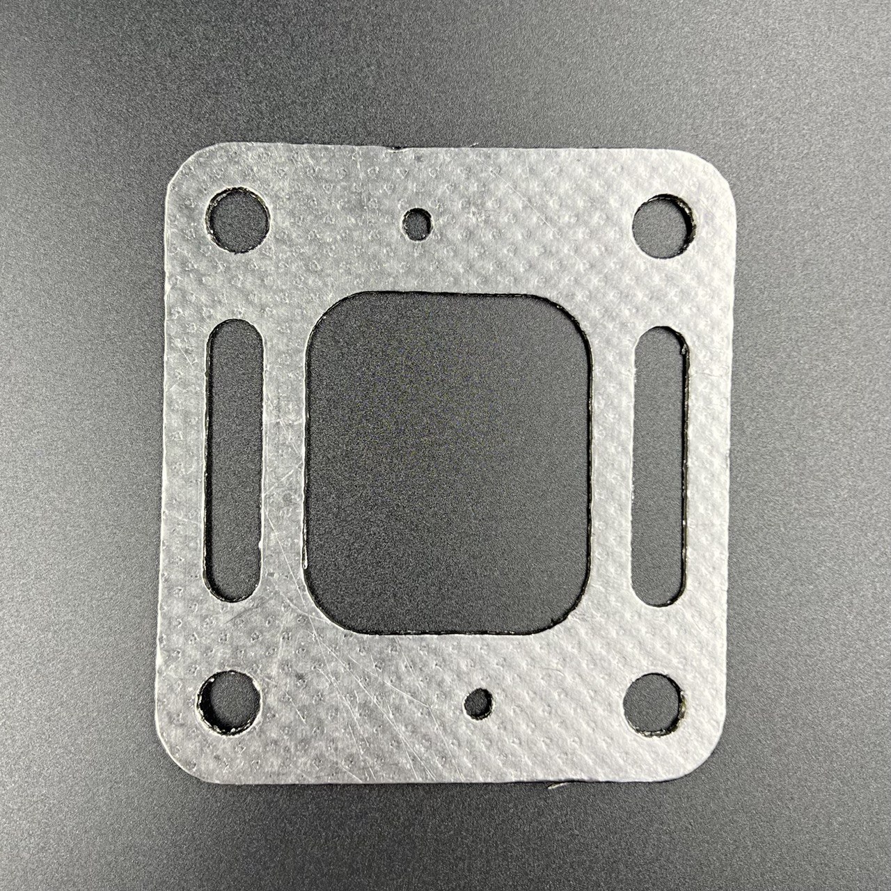 картинка Прокладка выхлопного коллектора Mercruiser V6-V8 (Omax)